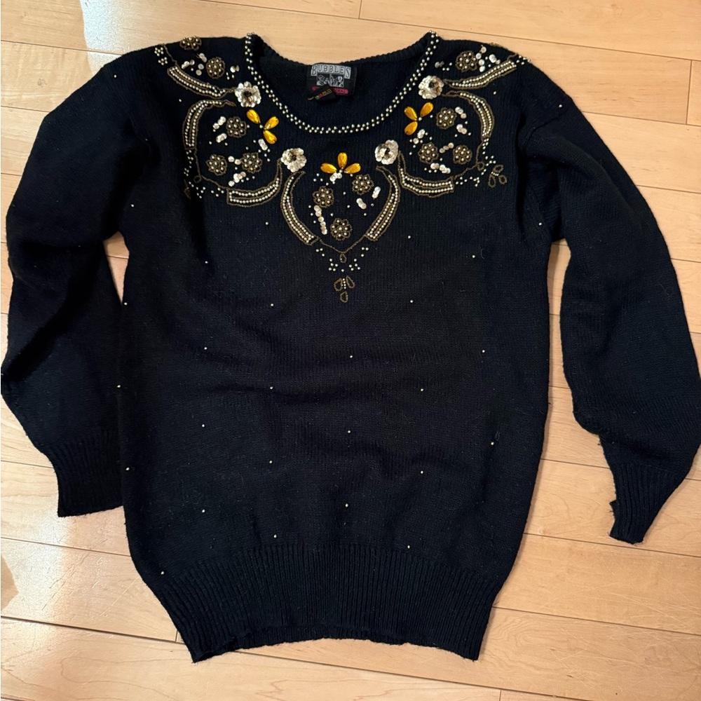 Elegant Black Sweater with Gold Accents